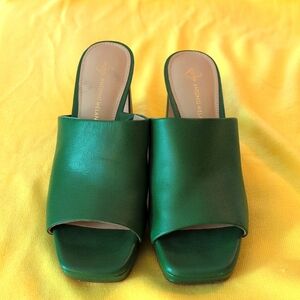 From Antonio Melani, the Divinna Leather Platform Slide Sandals size 7M